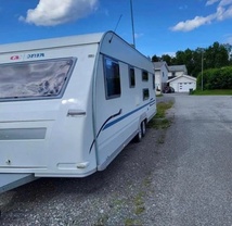 Location camping car adria