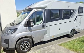 Location camping car adria